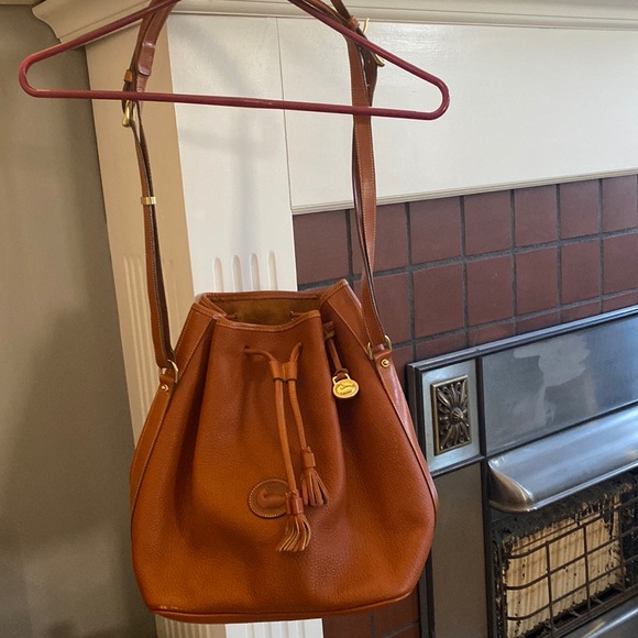 Dooney & Bourke Handbags - Authentic Dooney & Bourke Brown All Weather Leather Purse Bag